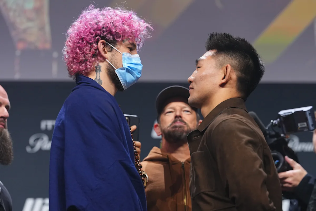 Song Yadong Dominates Sean O’Malley During COVID Mask Staredown: A Career Highlight