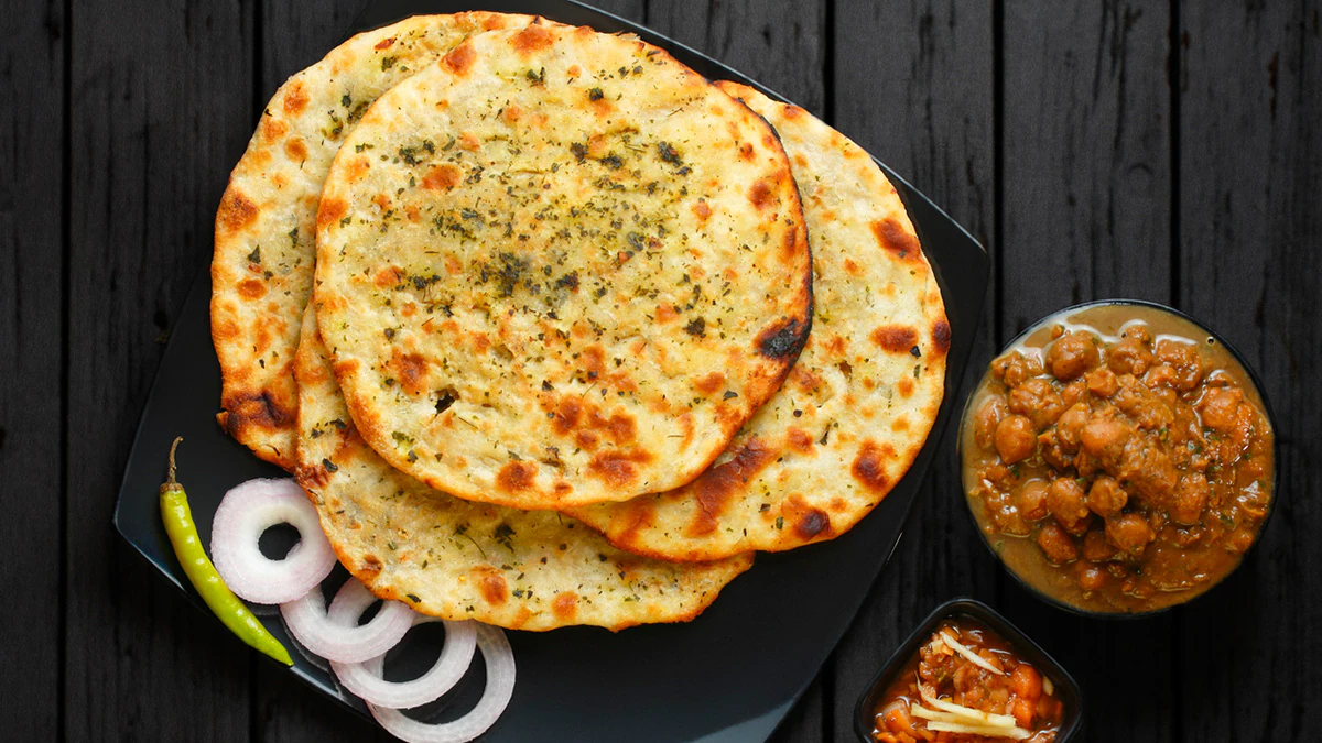 Top 10 Global Dishes: Featuring Amritsari Kulcha and Murg Makhani